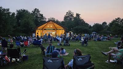 Photo is facing the amphitheater at Kimberton Park during a summer concert.